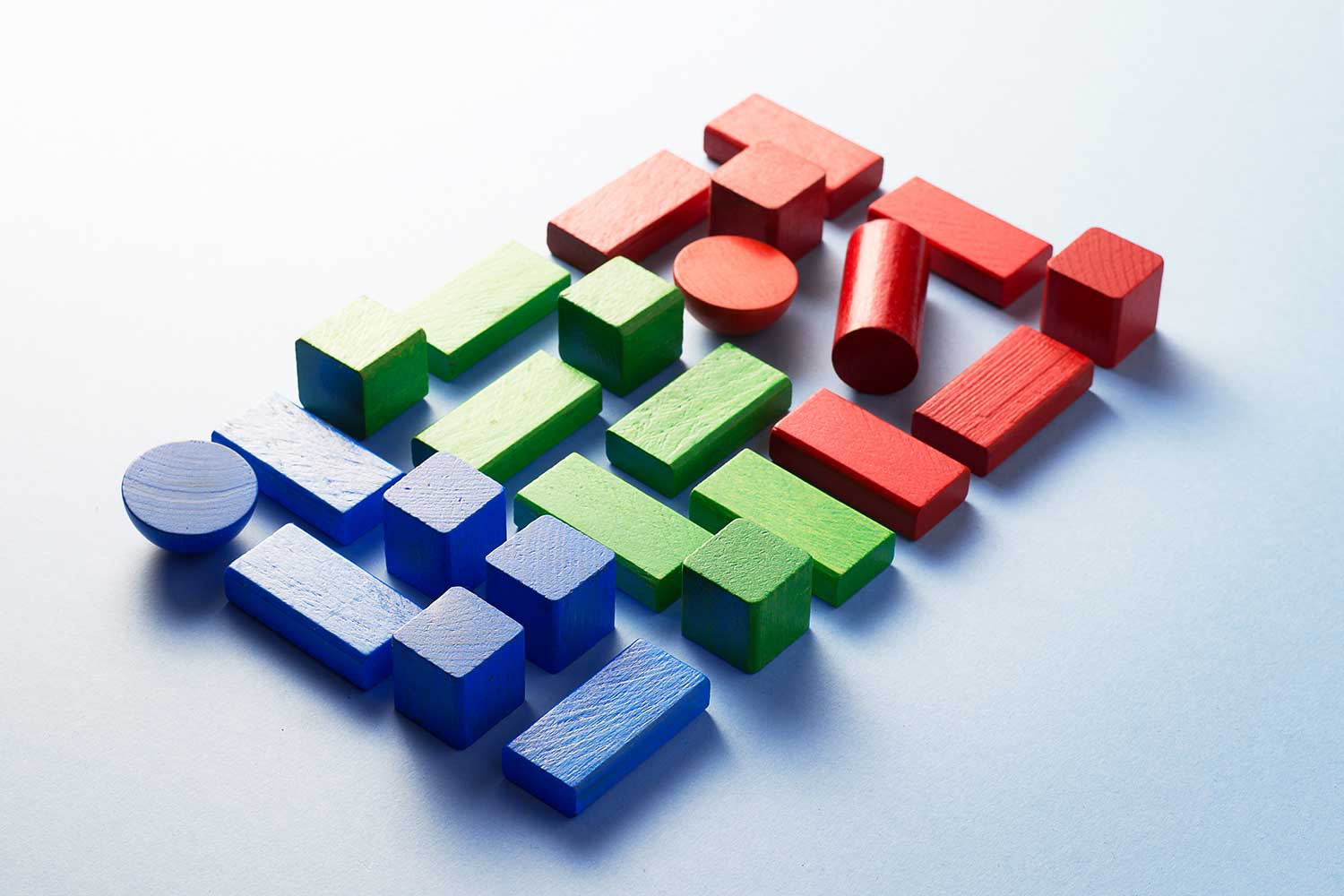 Objects organised into sets wooden building blocks