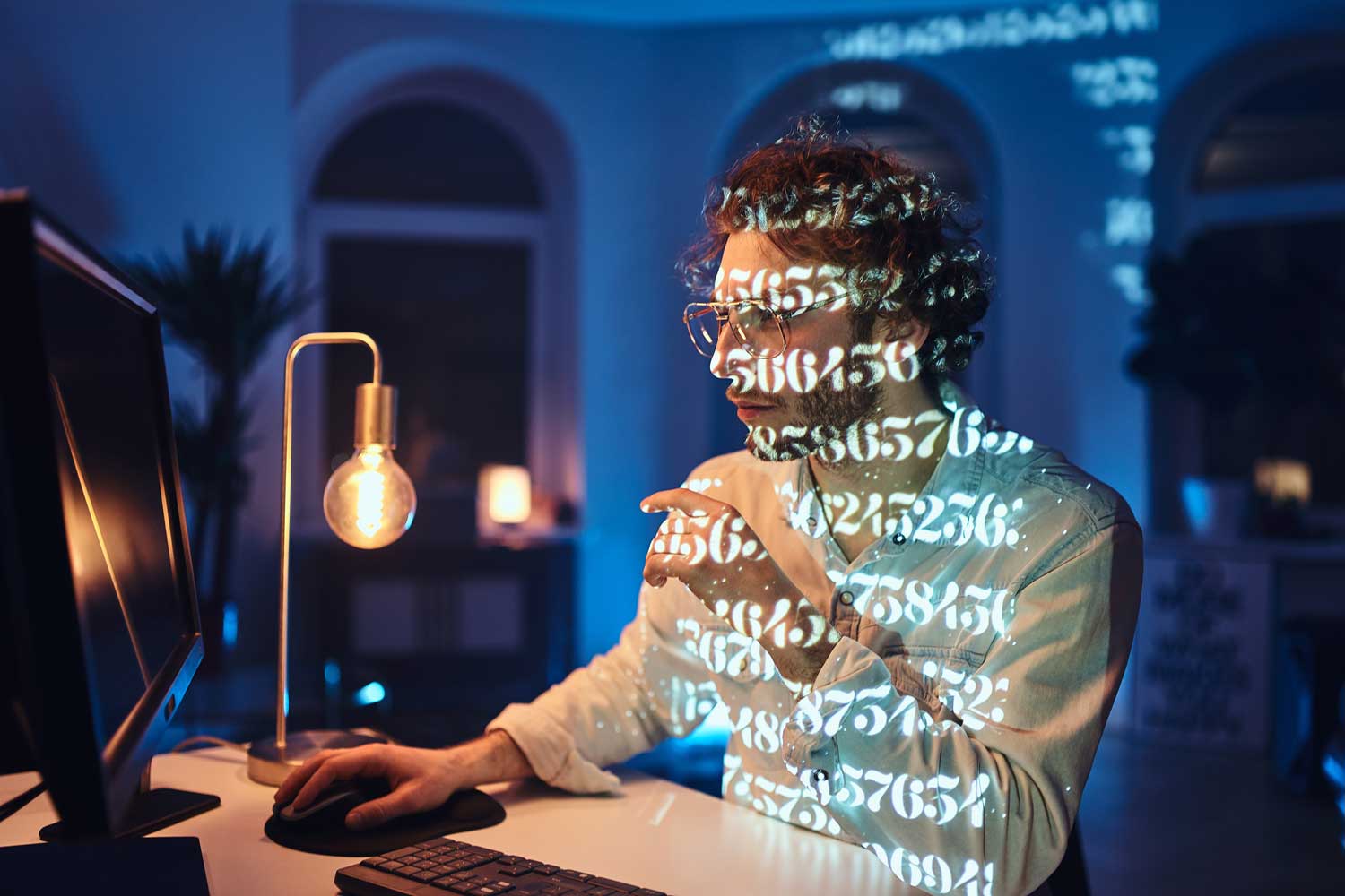 Software engineer with computer code across their face